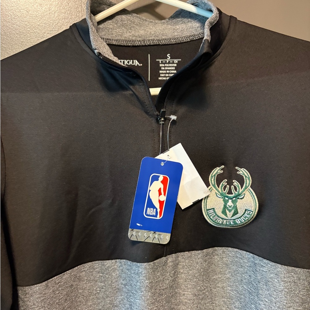 NBA Milwaukee Bucks size small, Antigua coat. Is 95% polyester 5% spandex